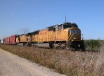 UP 4371  24Nov2011  NB at JAMA with mixed merchandise 